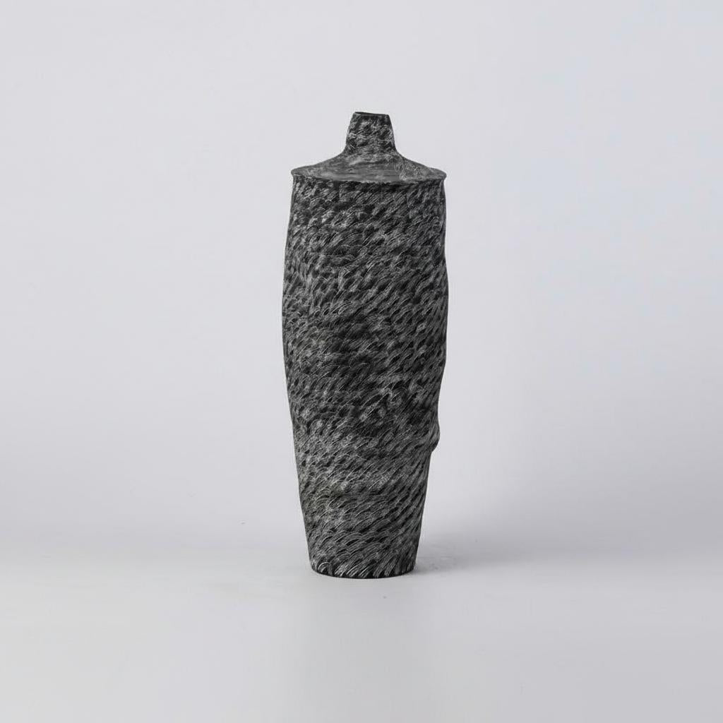Medium bulbous black ceramic vase with hand-etched texture