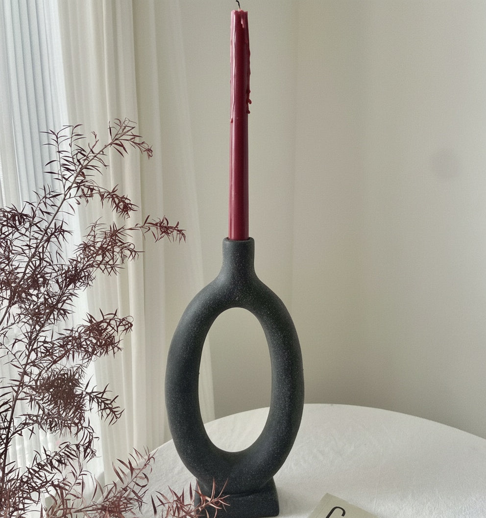 Textured Black Sculptural Taper Candle Holder with Red Candle