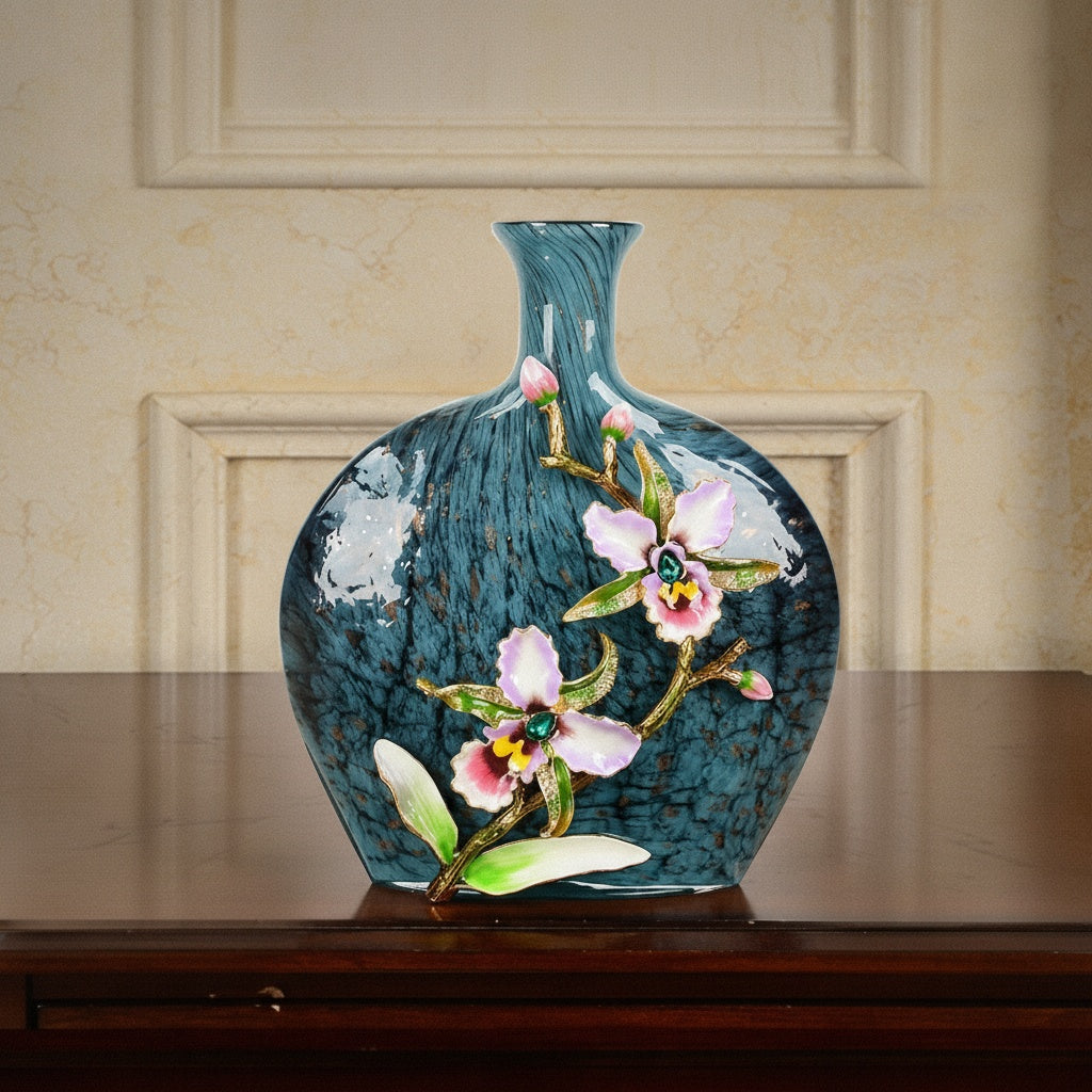 Front view of textured blue vase with gold stem floral art
