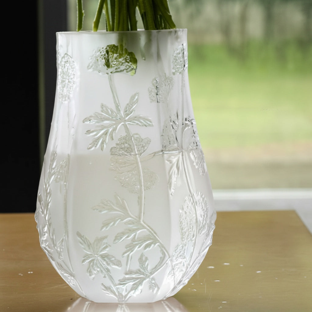 Textured botanical clear glass vase with floral arrangement