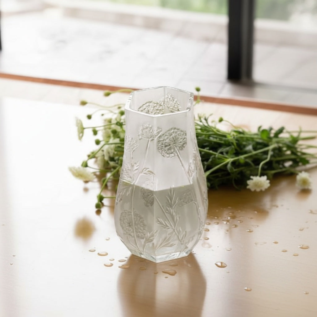 Close up of textured botanical clear glass vase