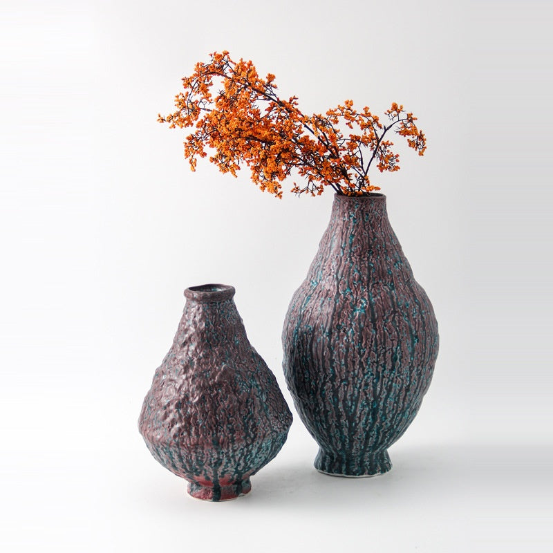 Set of two rustic ceramic vases with bark texture styling