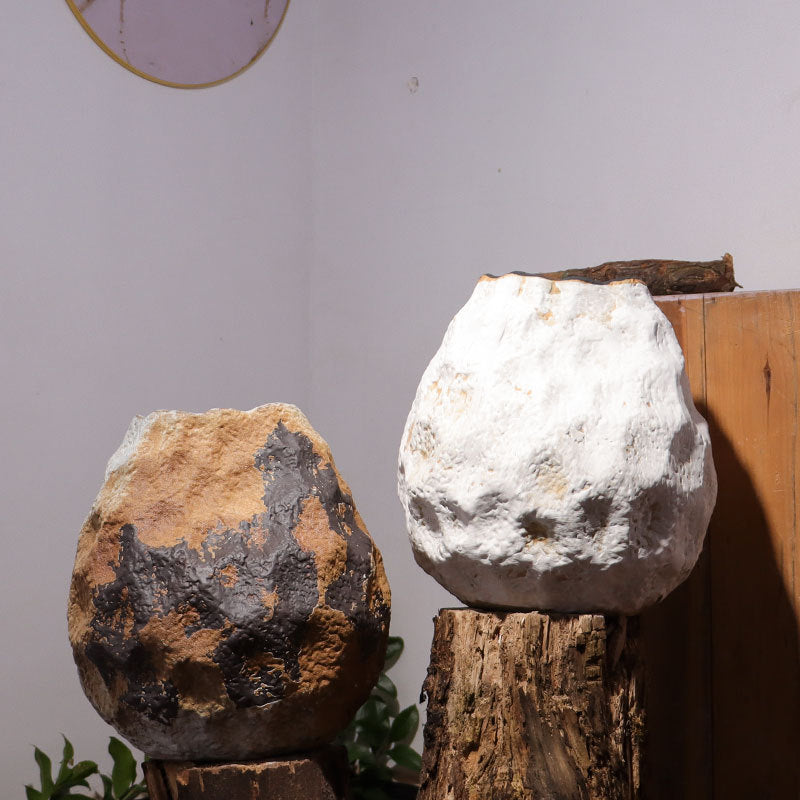 Two organic stone effect ceramic vases side by side