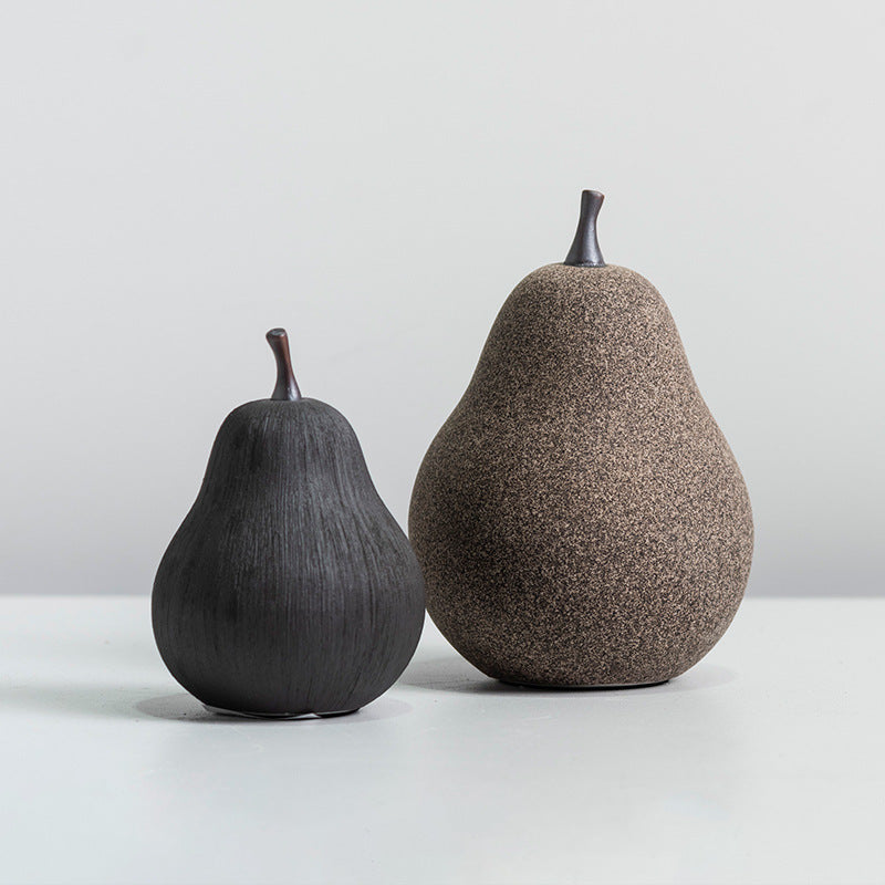 Ceramic pear sculpture set in speckled brown and matte black