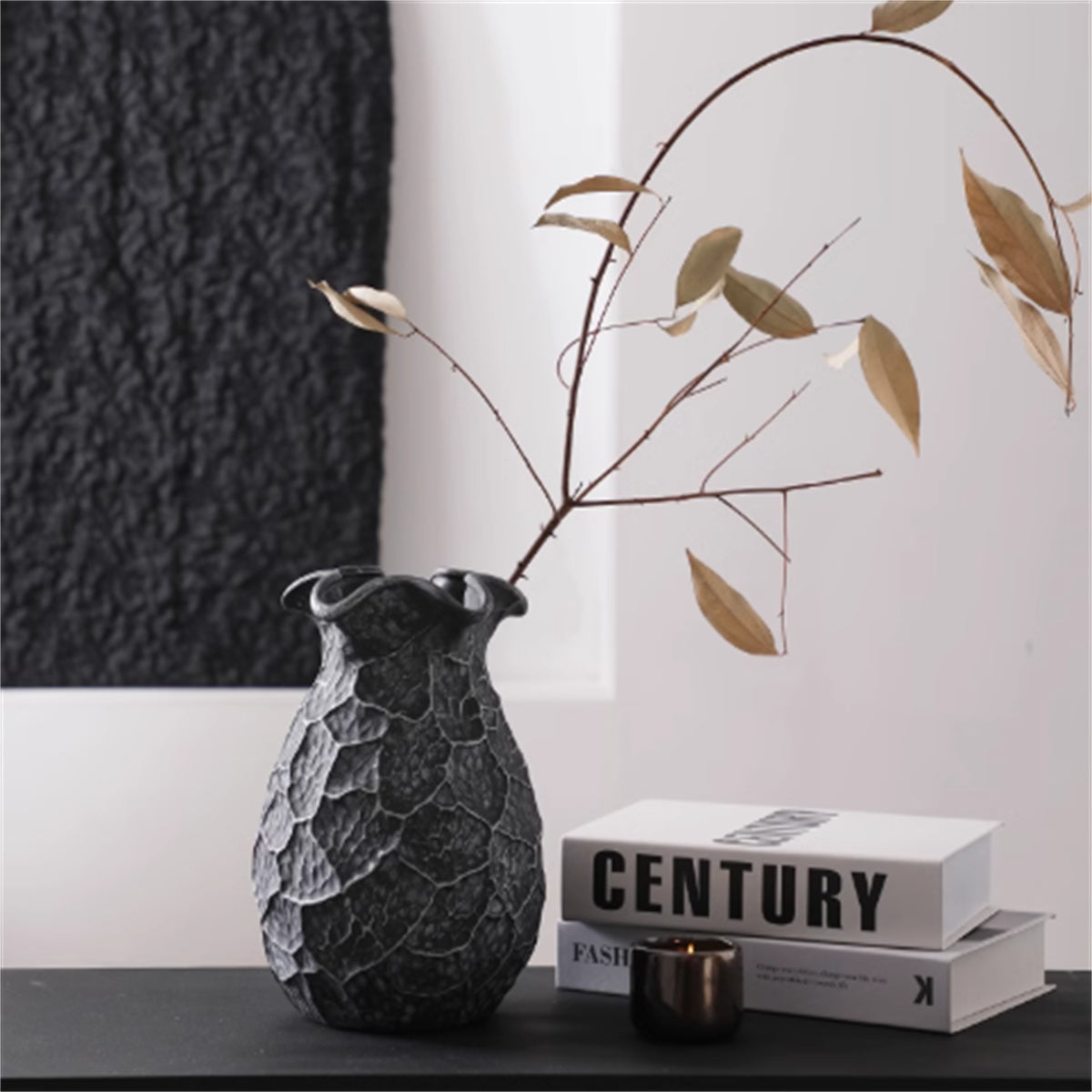Black textured ceramic vase with ruffled rim lifestyle shot