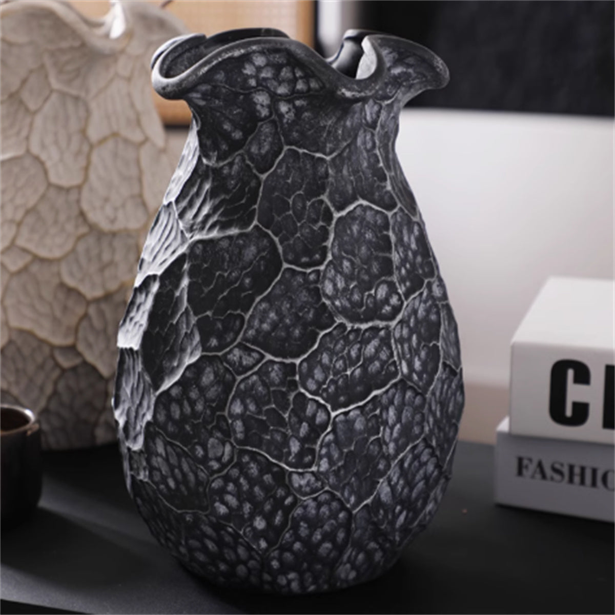 Close up detail of black ceramic vase texture