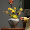 Textured Ceramic Tapered Vase on Wooden Table