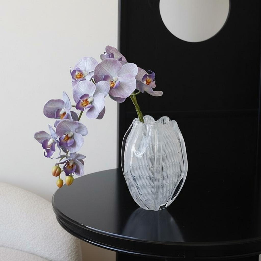 Detail of ribbed glass texture on oval vase