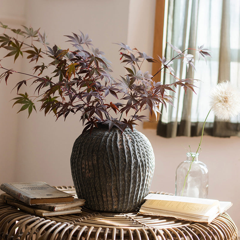Dark grey concrete vase with maple leaves styling