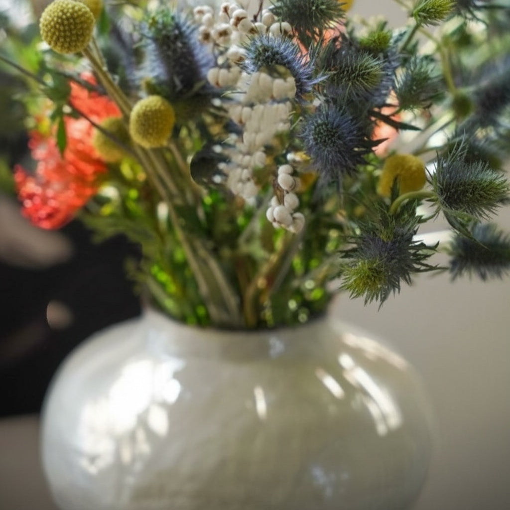 Textured Cream Sculptural Ceramic Vase with Flowers