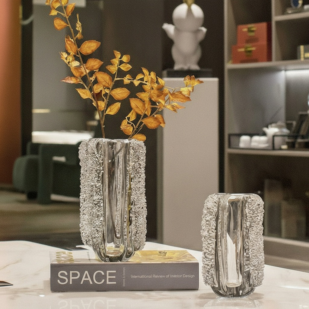 Lifestyle shot of large and medium crystal vases on coffee table