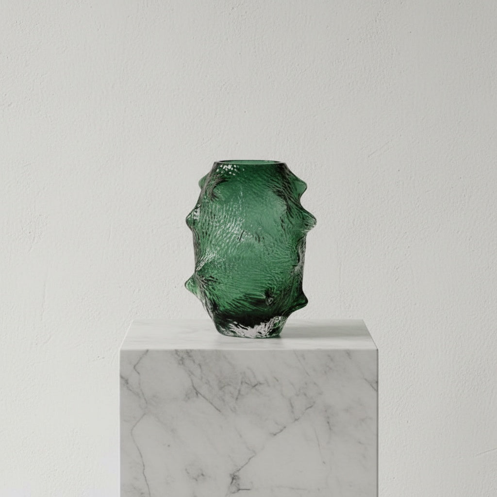 Medium textured emerald green glass vase isolated