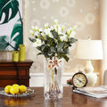 Lifestyle view of vase with white flowers on table