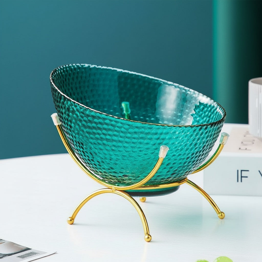 Teal textured glass fruit bowl with gold rim and gold metal stand