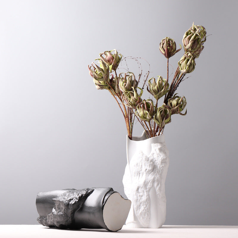 Ceramic vases with dried floral arrangement