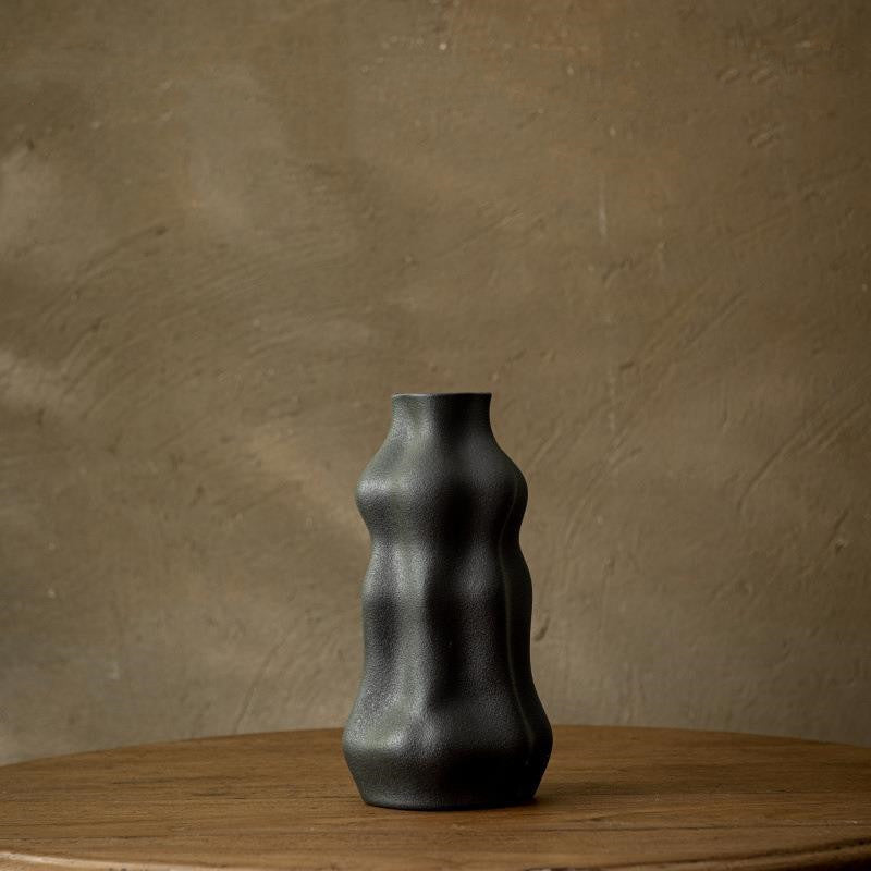 Close up of black textured ceramic finish