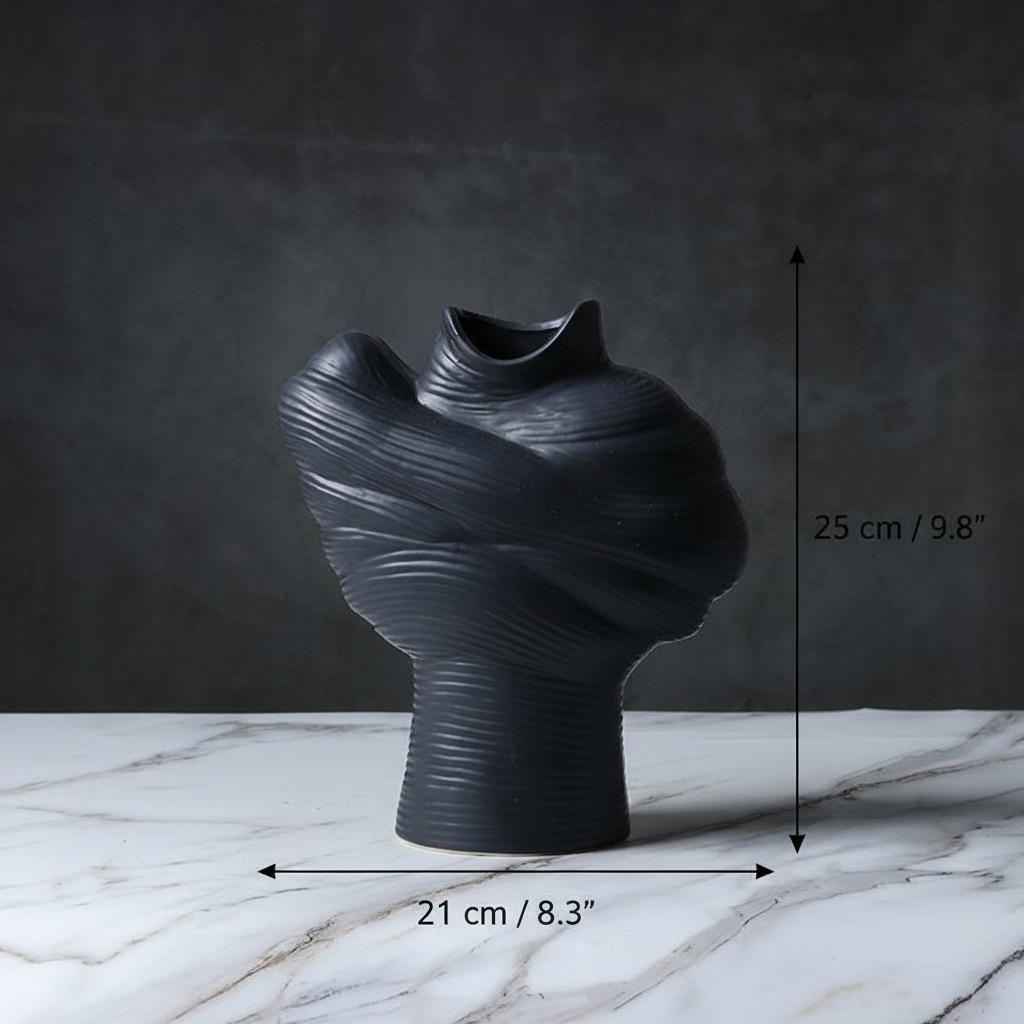 Close up of white textured porcelain vase showing ribbed details