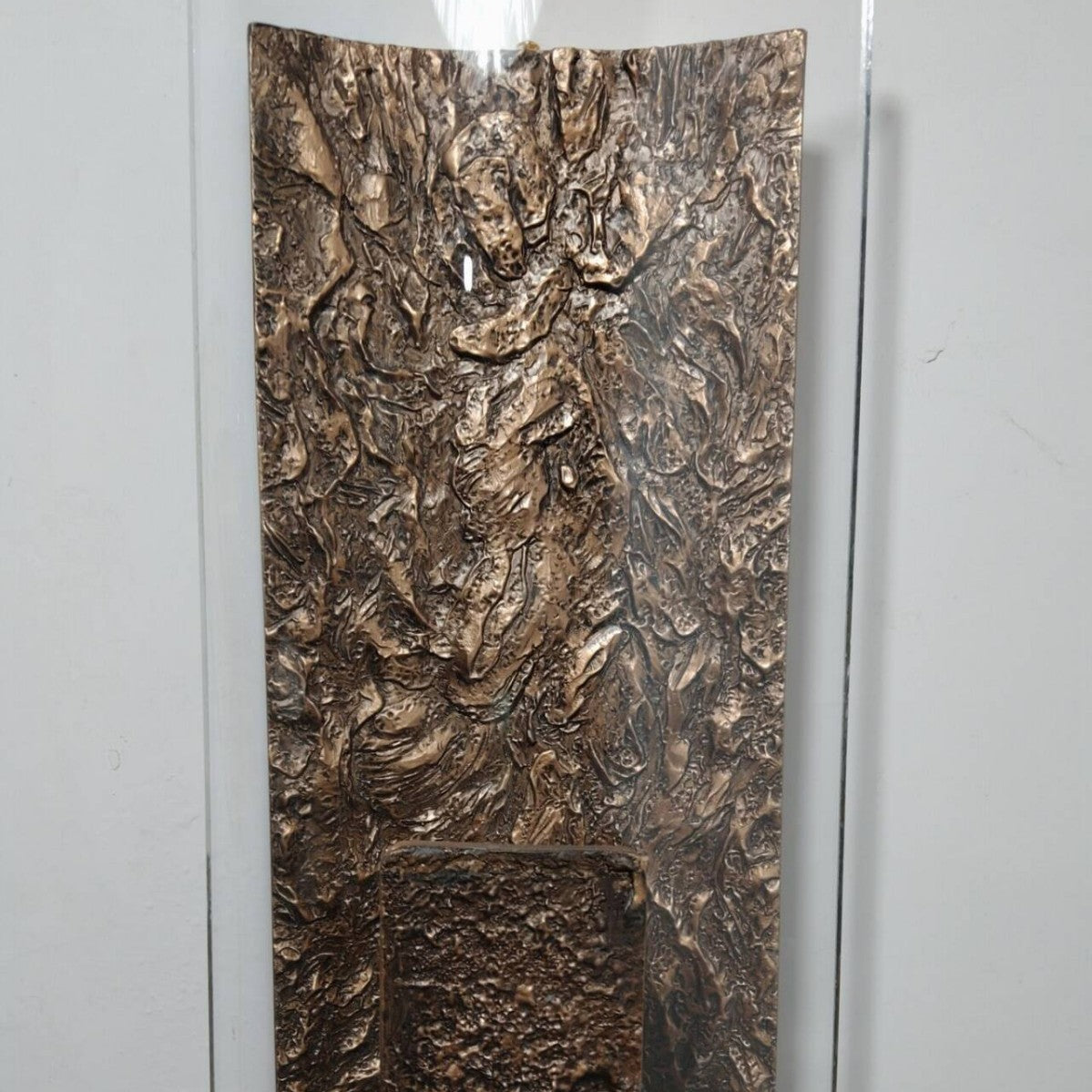 Detail of bronze finish texture and resin surface