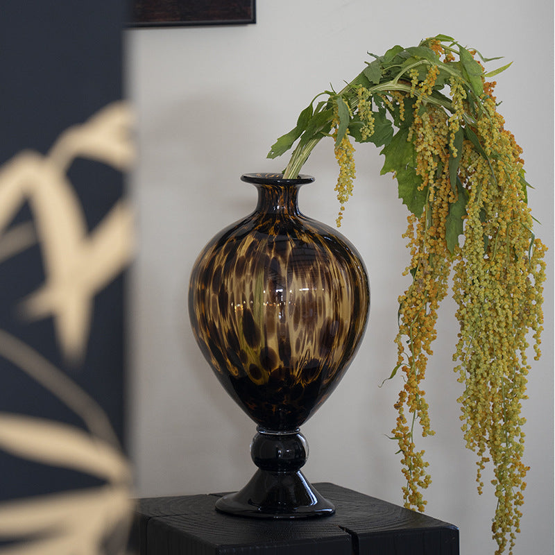Detail of tortoise shell pattern on glass pedestal vase