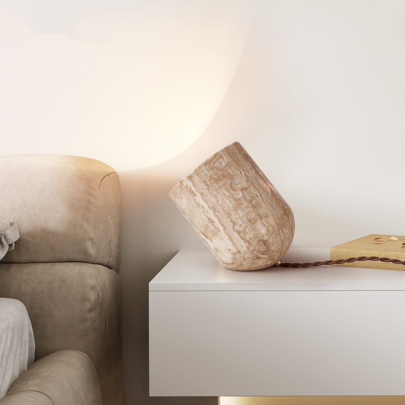Natural stone table lamp on bedside table