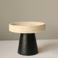 Angled view of empty stone pedestal bowl