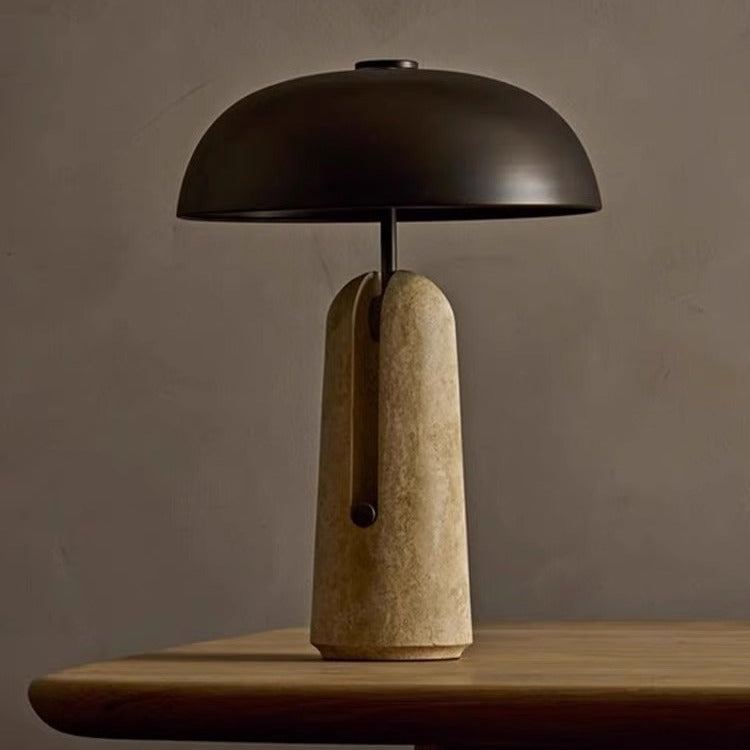 Front view of unlit travertine stone lamp with black dome