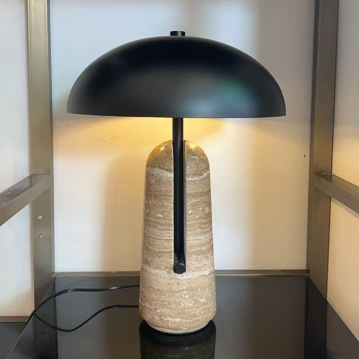 Side angle detail of cave stone texture and metal stem