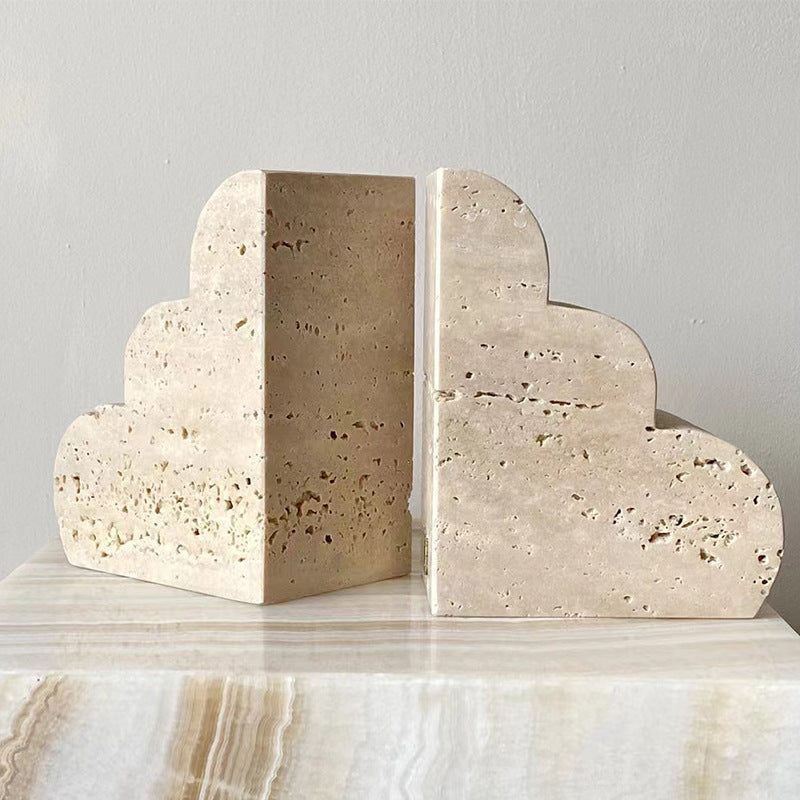Back and side angle of stepped stone bookends showing thick travertine profile