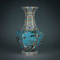 Front view of turquoise porcelain hexagonal vase with bird and floral motif