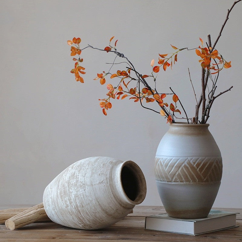 Two-tone ceramic vase with autumn branches
