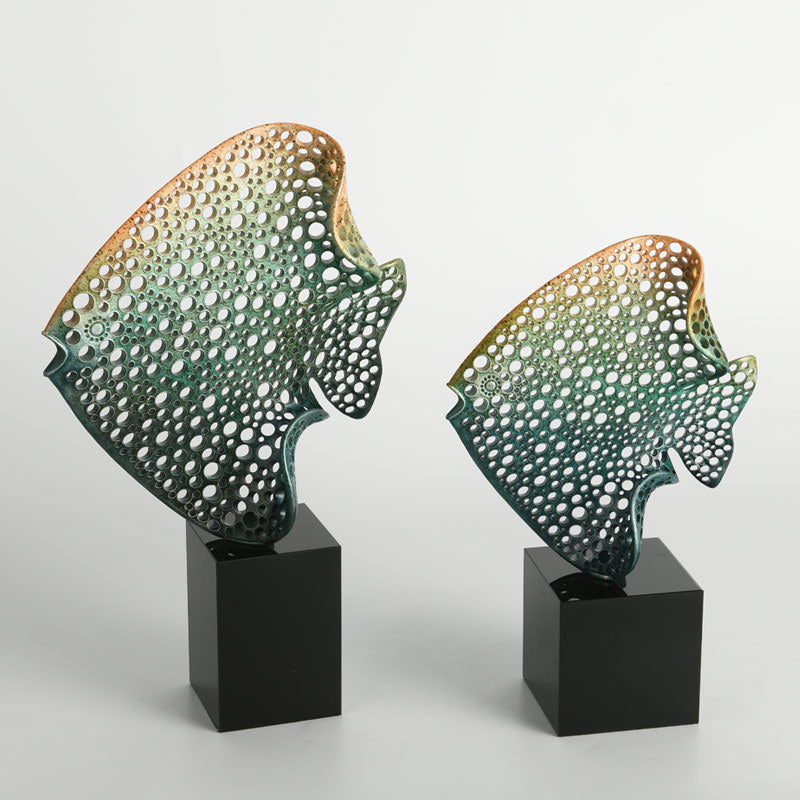 Pair of modern alloy fish statues with perforated design