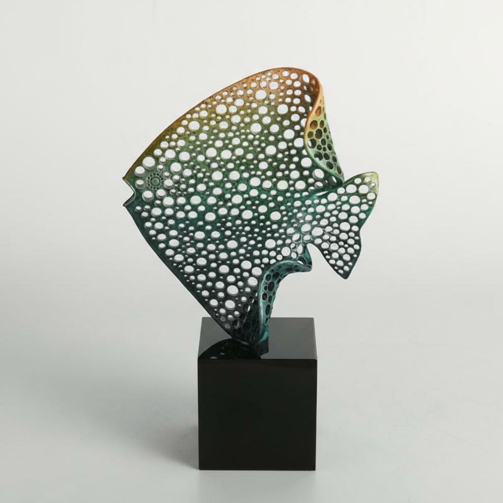 Front view of medium green and bronze fish statue