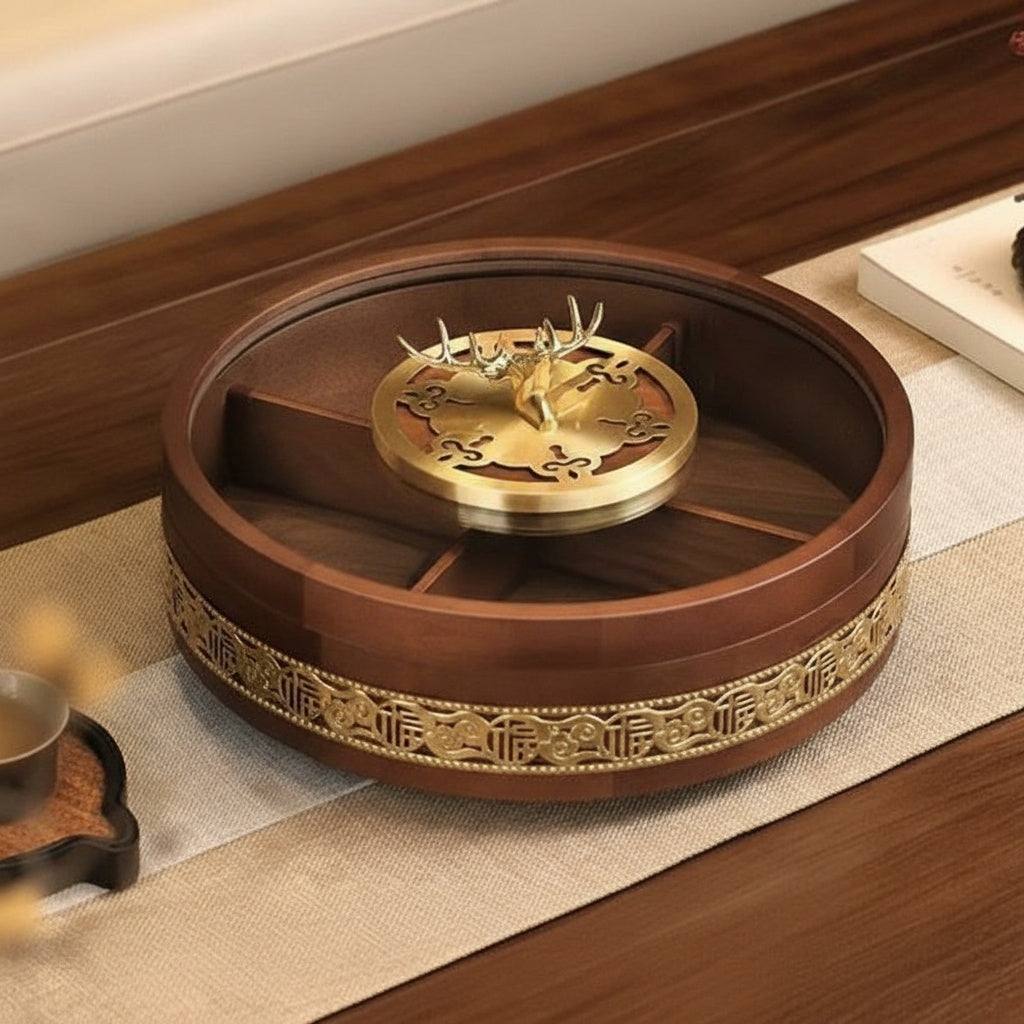 Walnut wood serving tray with brass deer handle on table