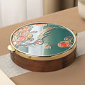 Walnut wood serving box with teal enamel lid featuring bird and fruit design