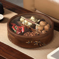Walnut wood round divided serving box with glass lid and brass handle