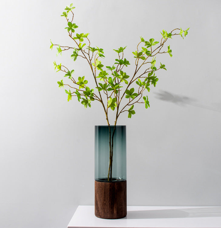 Cylindrical variation of walnut wood and smoked glass vase