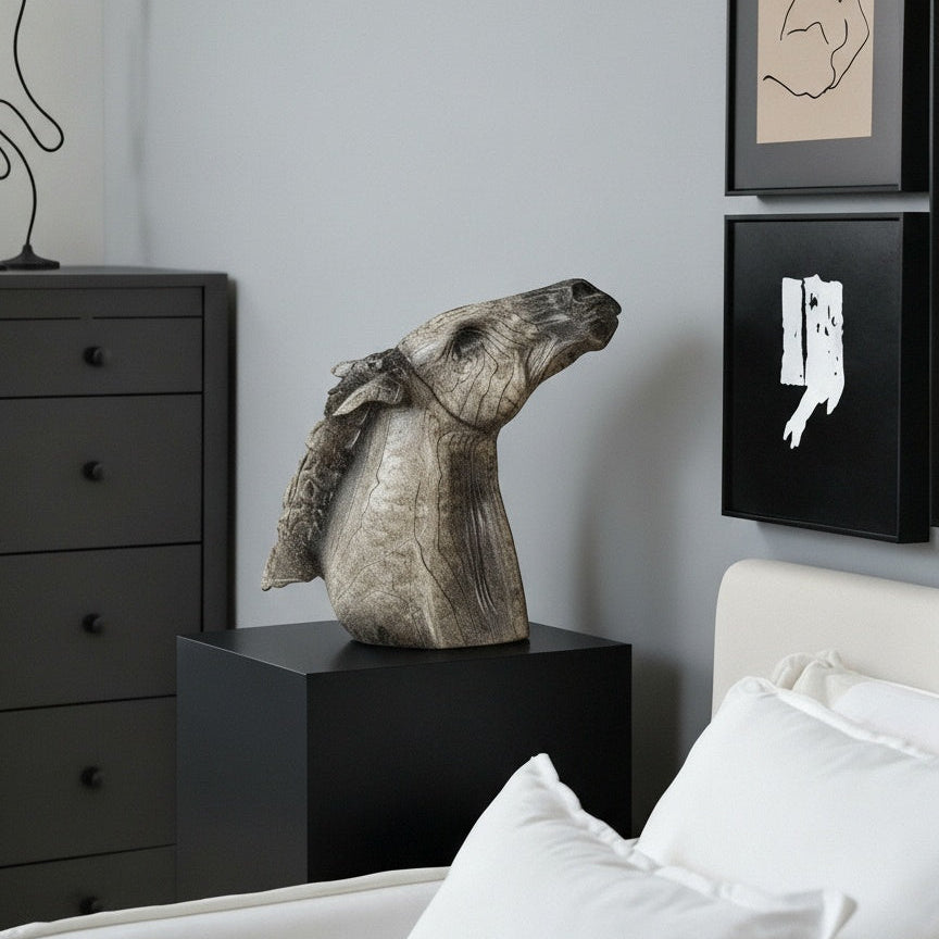 Ceramic horse sculpture styled in modern bedroom context