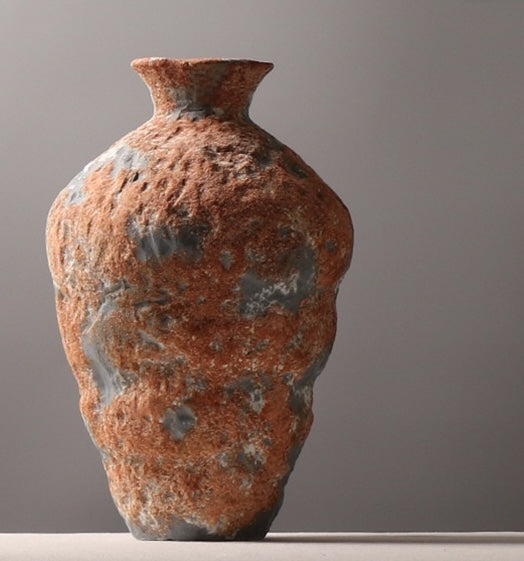 Squat weathered ceramic vase solo view