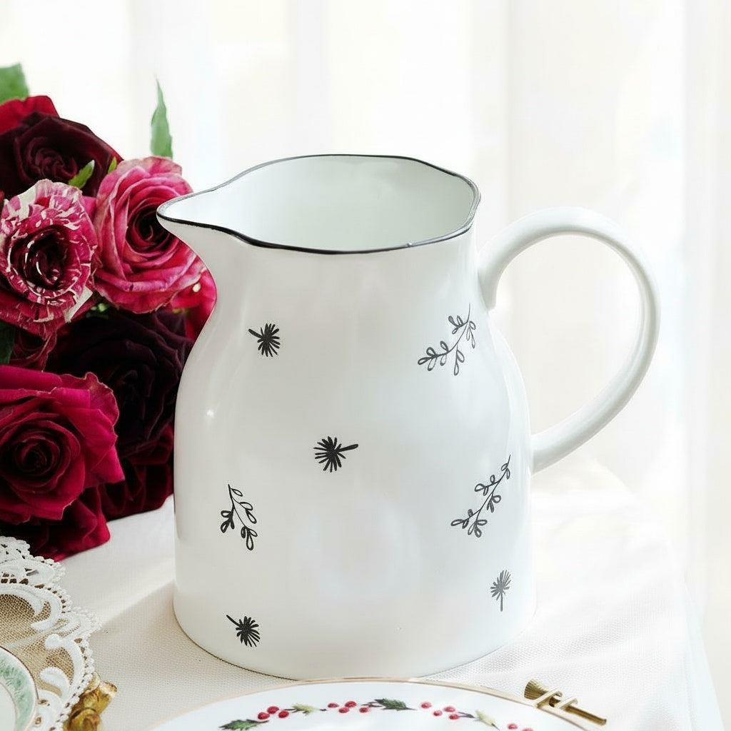 White Ceramic Botanical Handled Pitcher Styled With Flowers