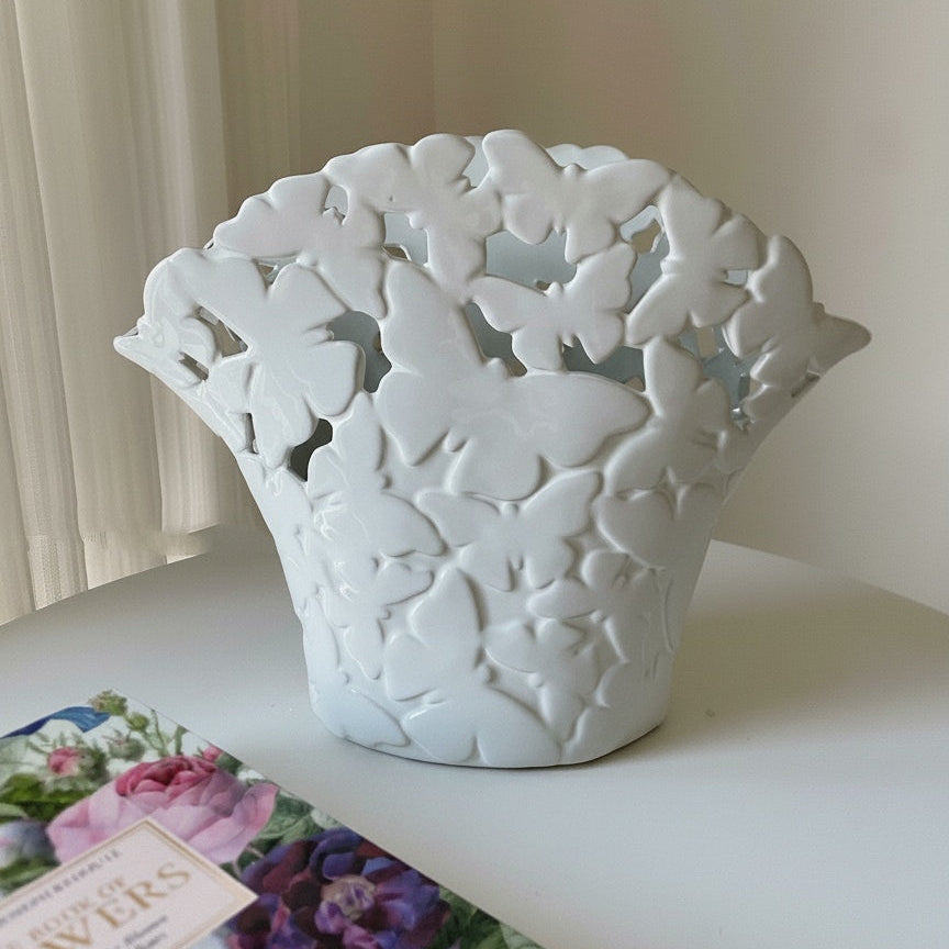 Front view of the white ceramic butterfly vase