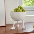 White Ceramic Footed Decorative Bowl styled on wooden table
