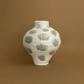 Large white ceramic bulbous vase with textured surface