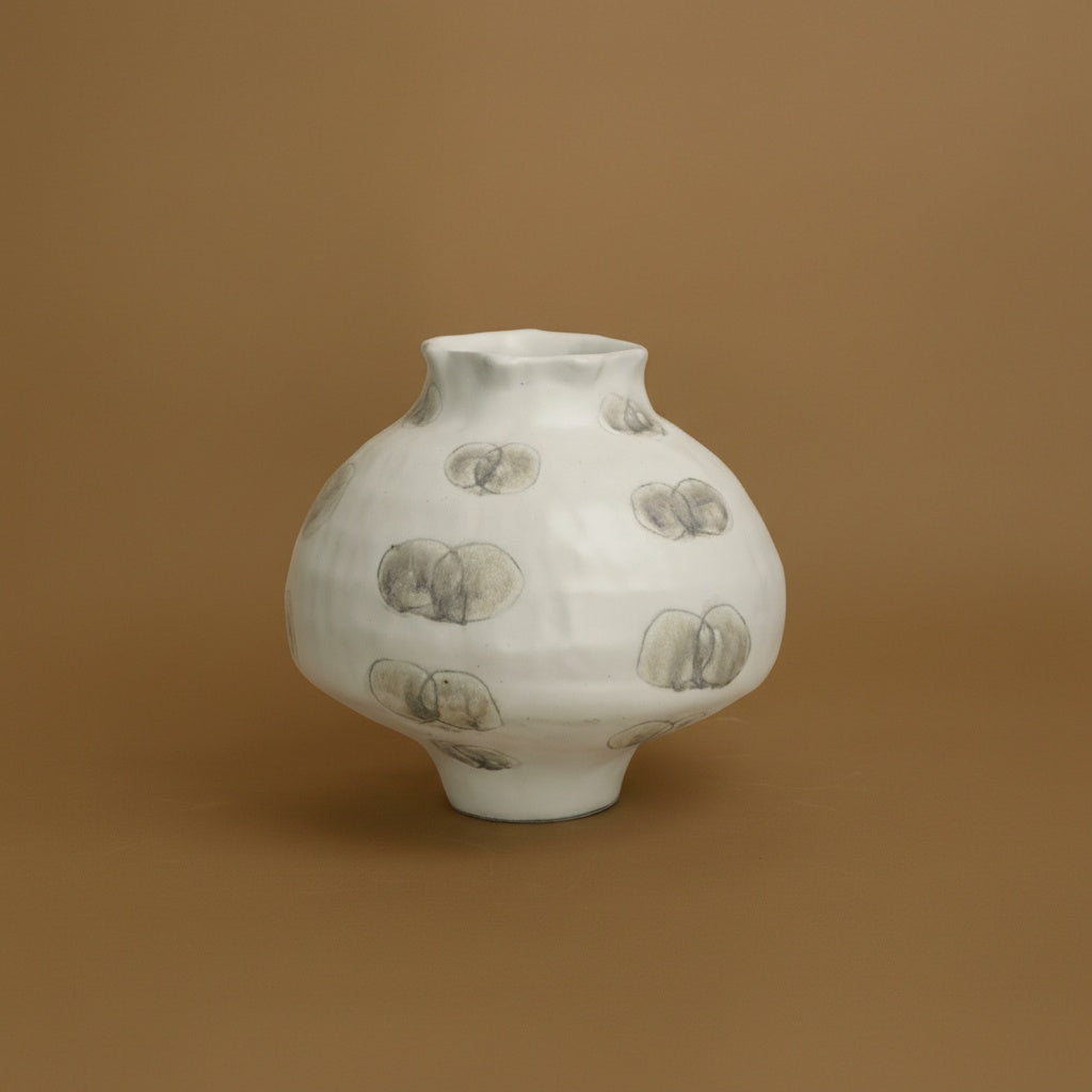 Medium white ceramic vase with hand painted abstract design