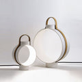 White circular lantern table lamp studio view