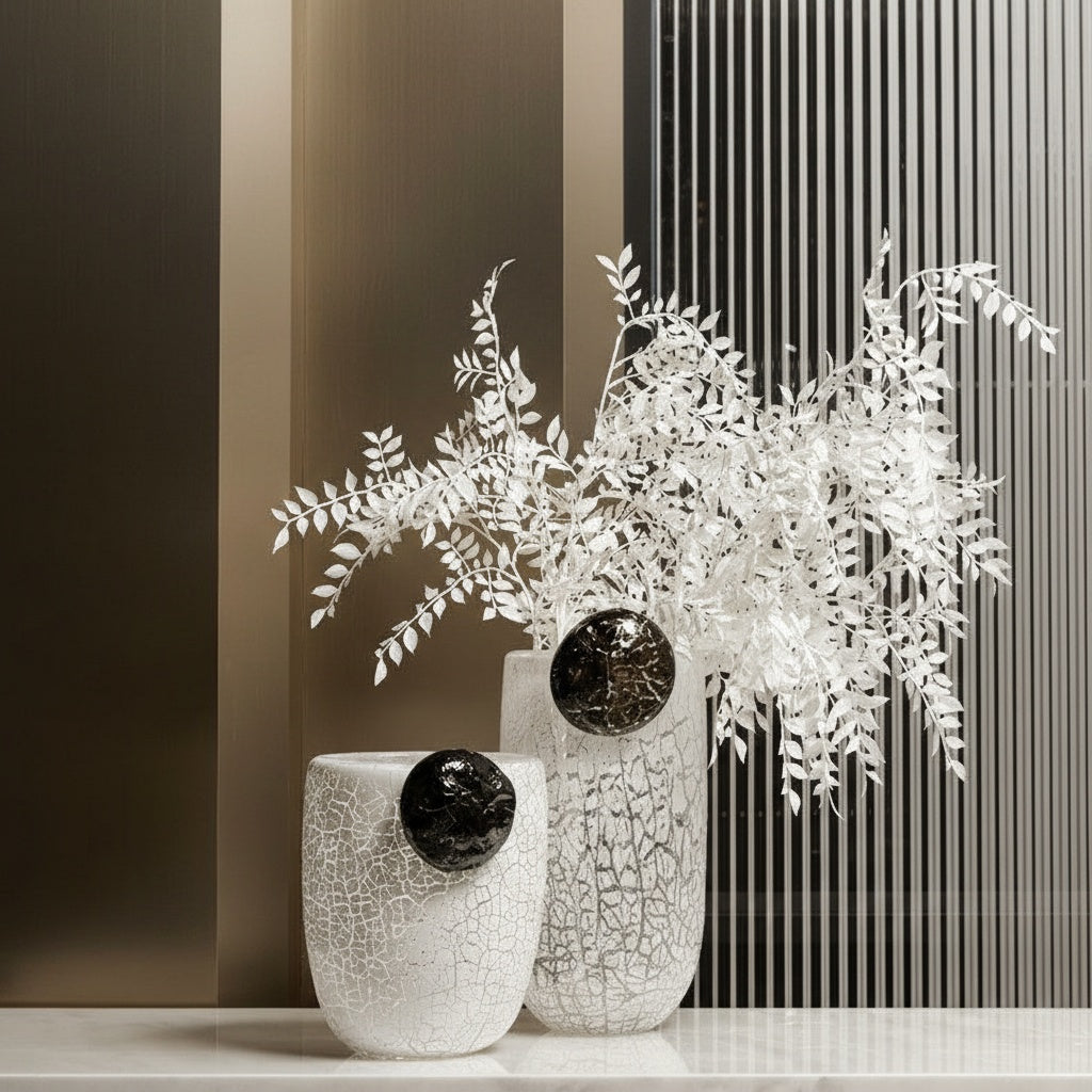 Frosted crackle glass vase with black stone accent and white leaves