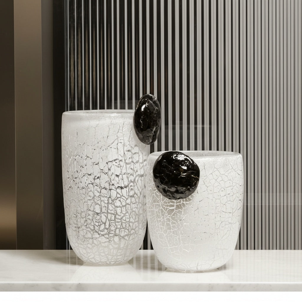 Set of two white crackle glass vases with black accents
