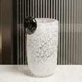 Close up of large white frosted crackle vase with black detail