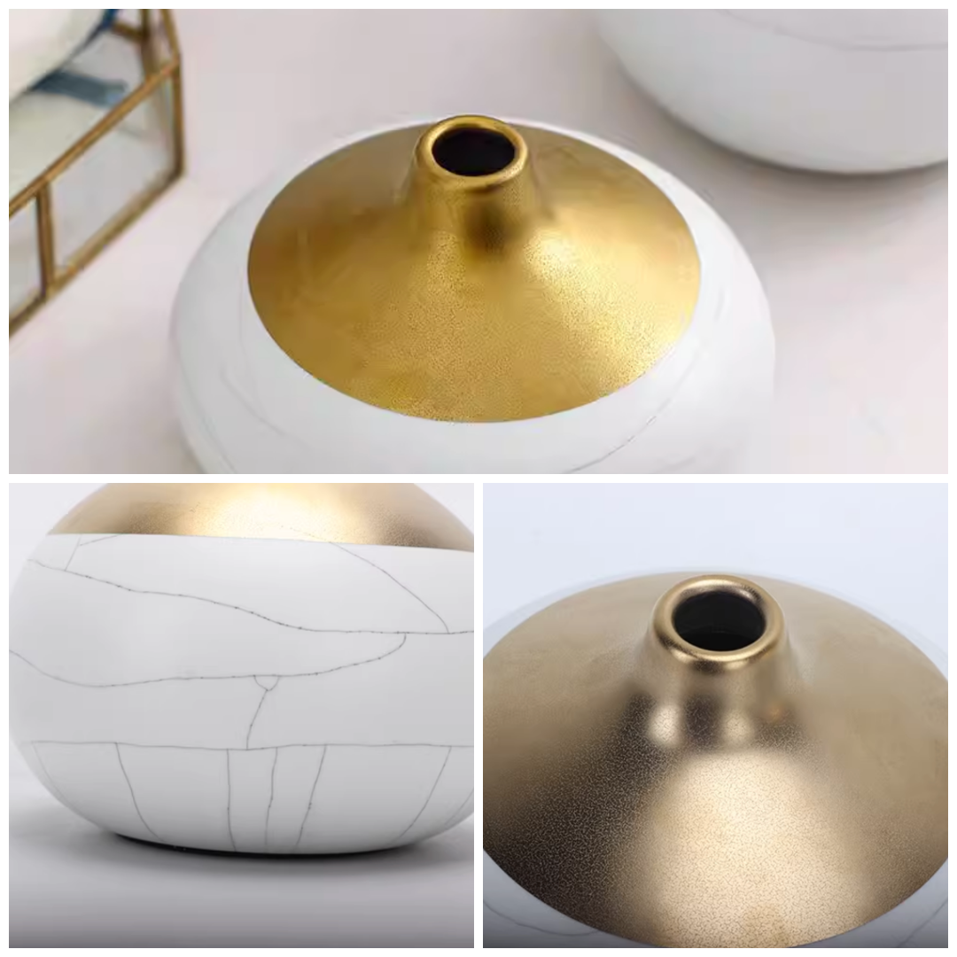 Close up of crackle glaze texture on white porcelain vase with gold dipped top