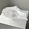 White glass seashell centerpiece bowl top view
