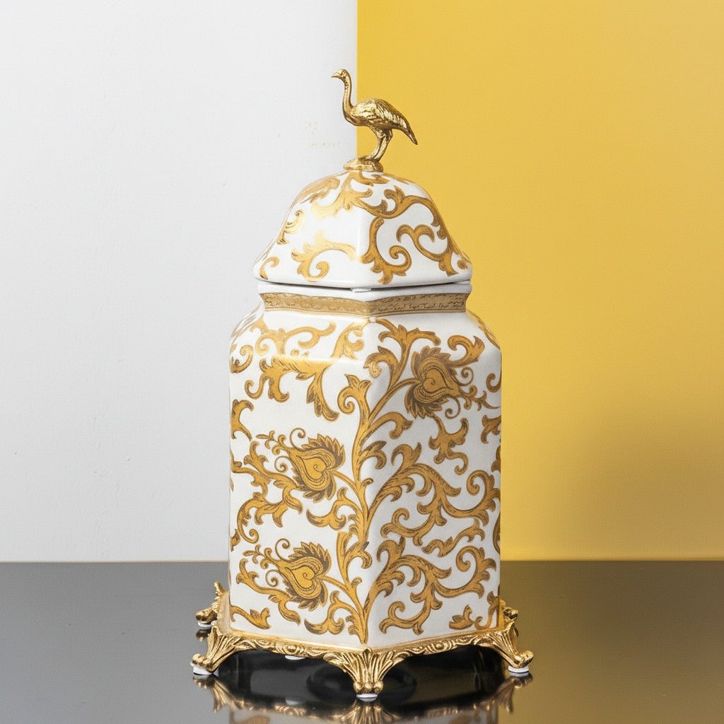 Medium white and gold ceramic jar with gold bird lid